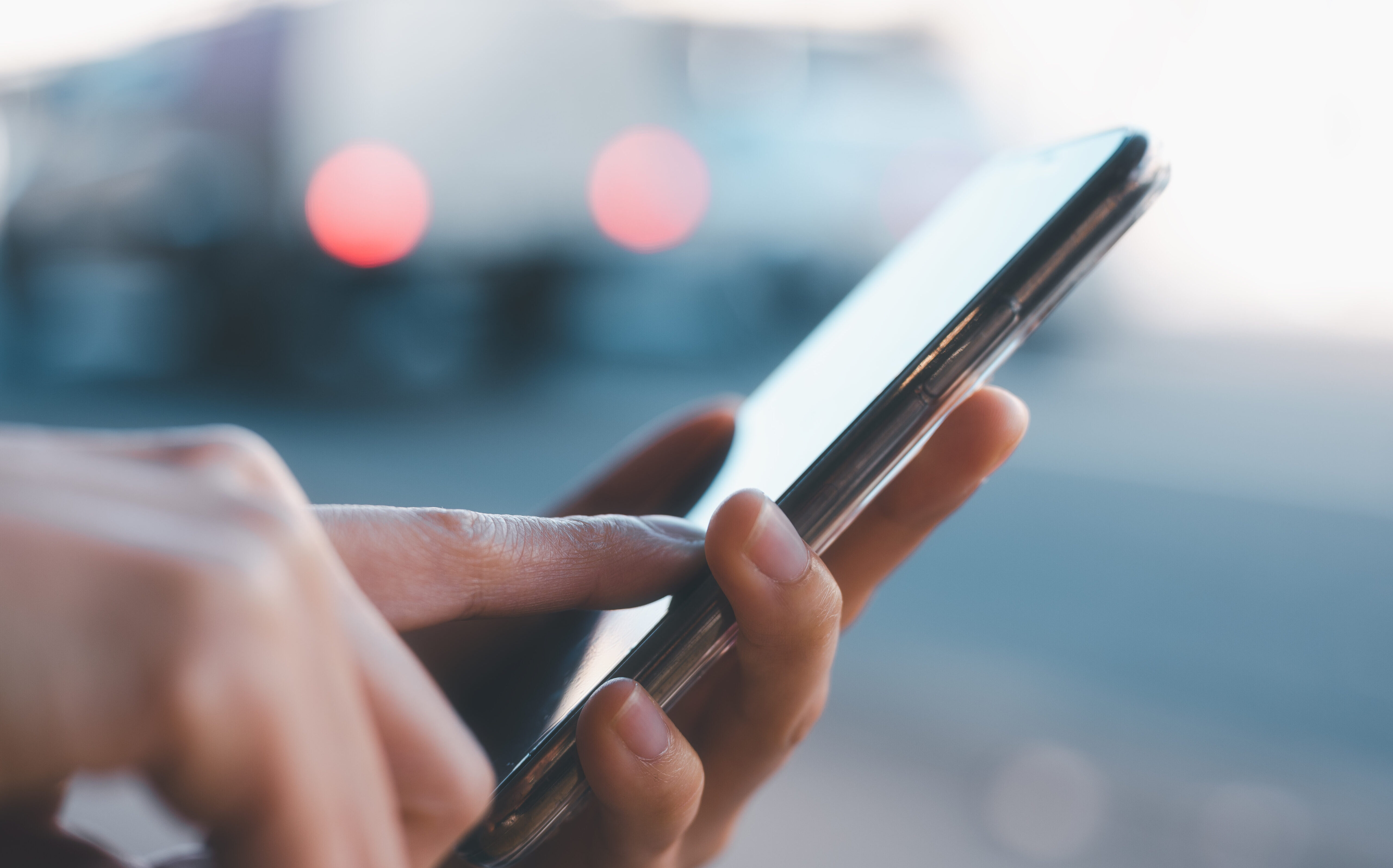 Social media marketing concept. Women hand using smartphone typing, chatting conversation in chat box icons pop up
